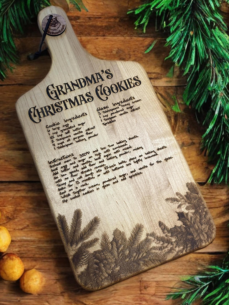 Wooden cutting board with an engraved recipe titled Grandma&