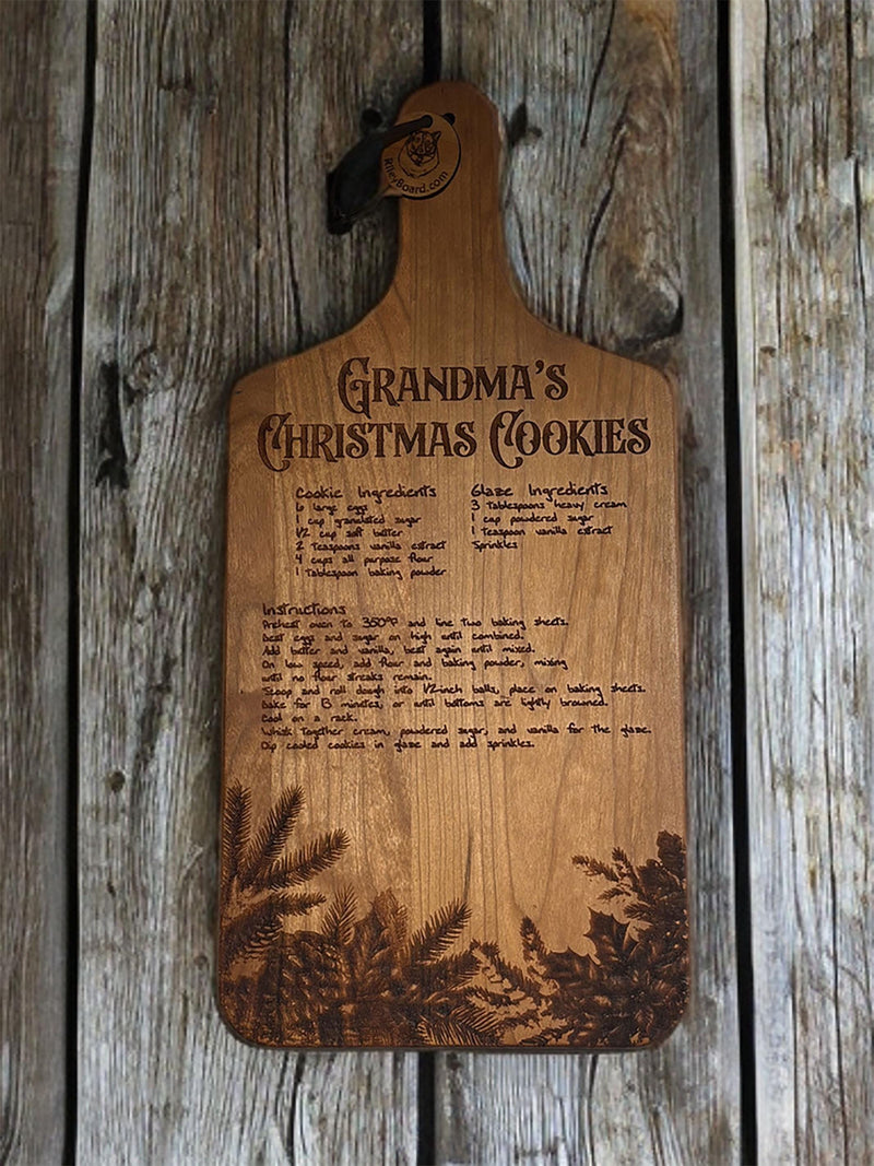 Wooden cutting board with an engraved recipe titled Grandma&