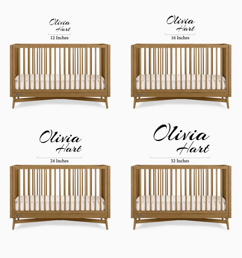 A size comparison chart for nursery baby name sign above a wooden crib. The chart displays four sizes: 12 inches, 16 inches, 24 inches, and 32 inches, illustrating how each size fits proportionally above the crib.